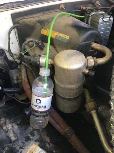 Catch Bottle for Filter Bleed Leak.JPG