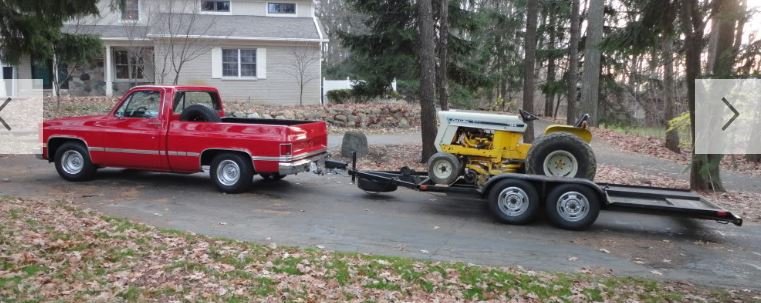 Red Truck working lo boy.JPG